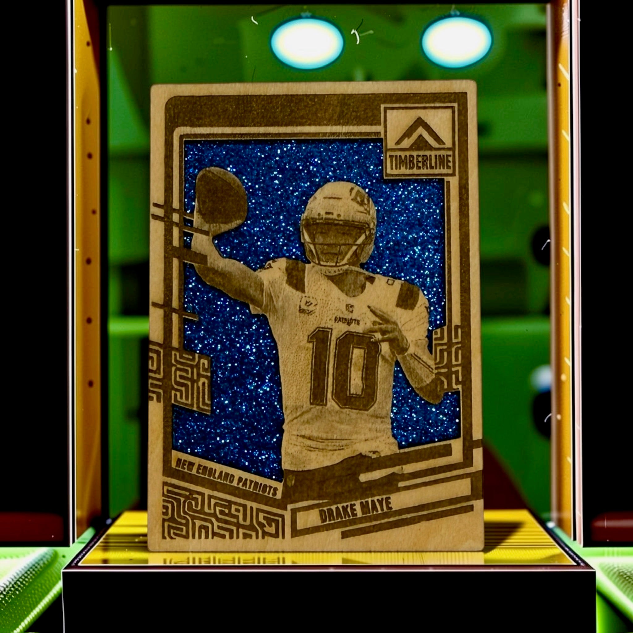 Drake Maye New England Patriots laser-engraved wooden trading card with blue glitter background