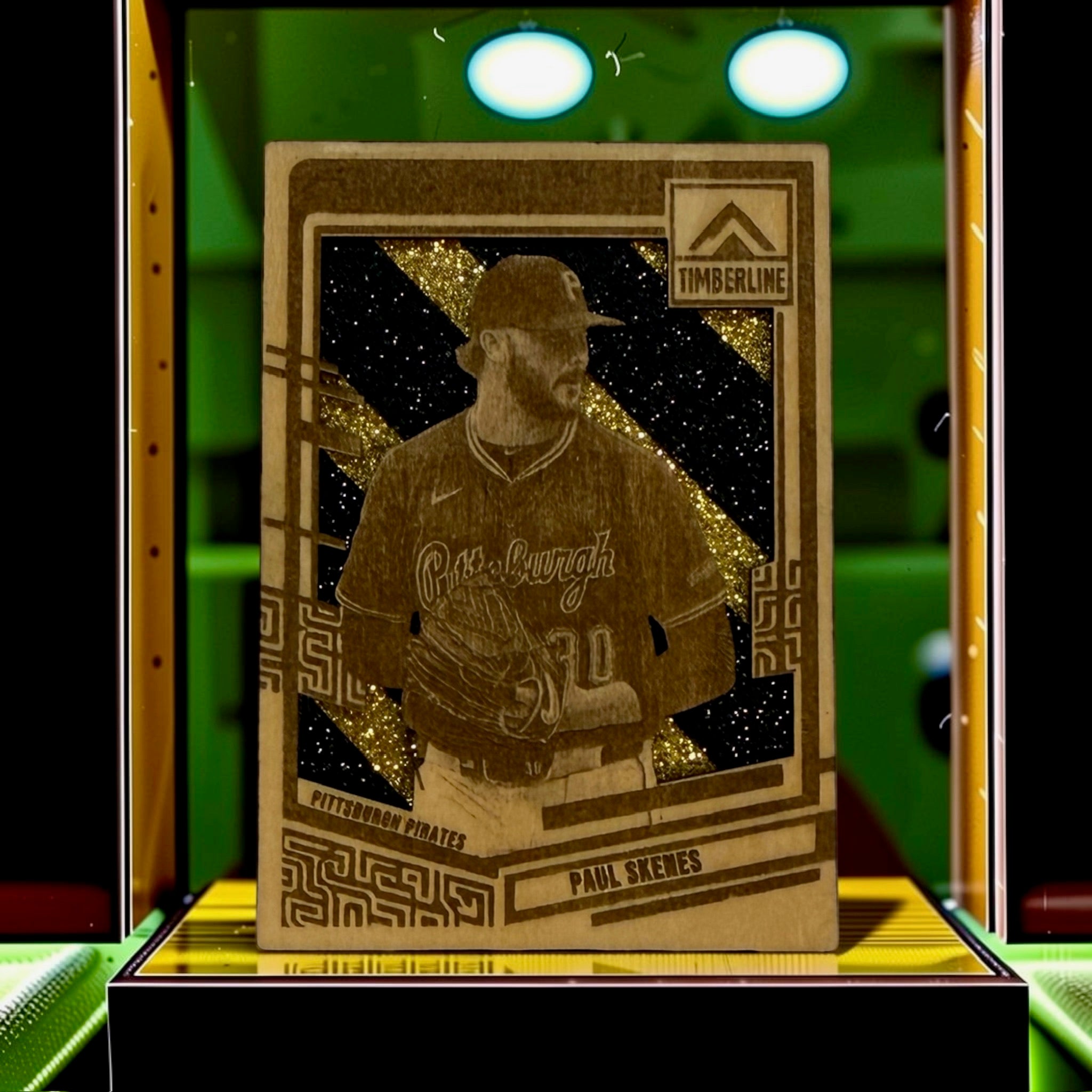 Paul Skenes Pittsburgh Pirates laser-engraved wooden trading card with black and gold glitter diagonal stripe background