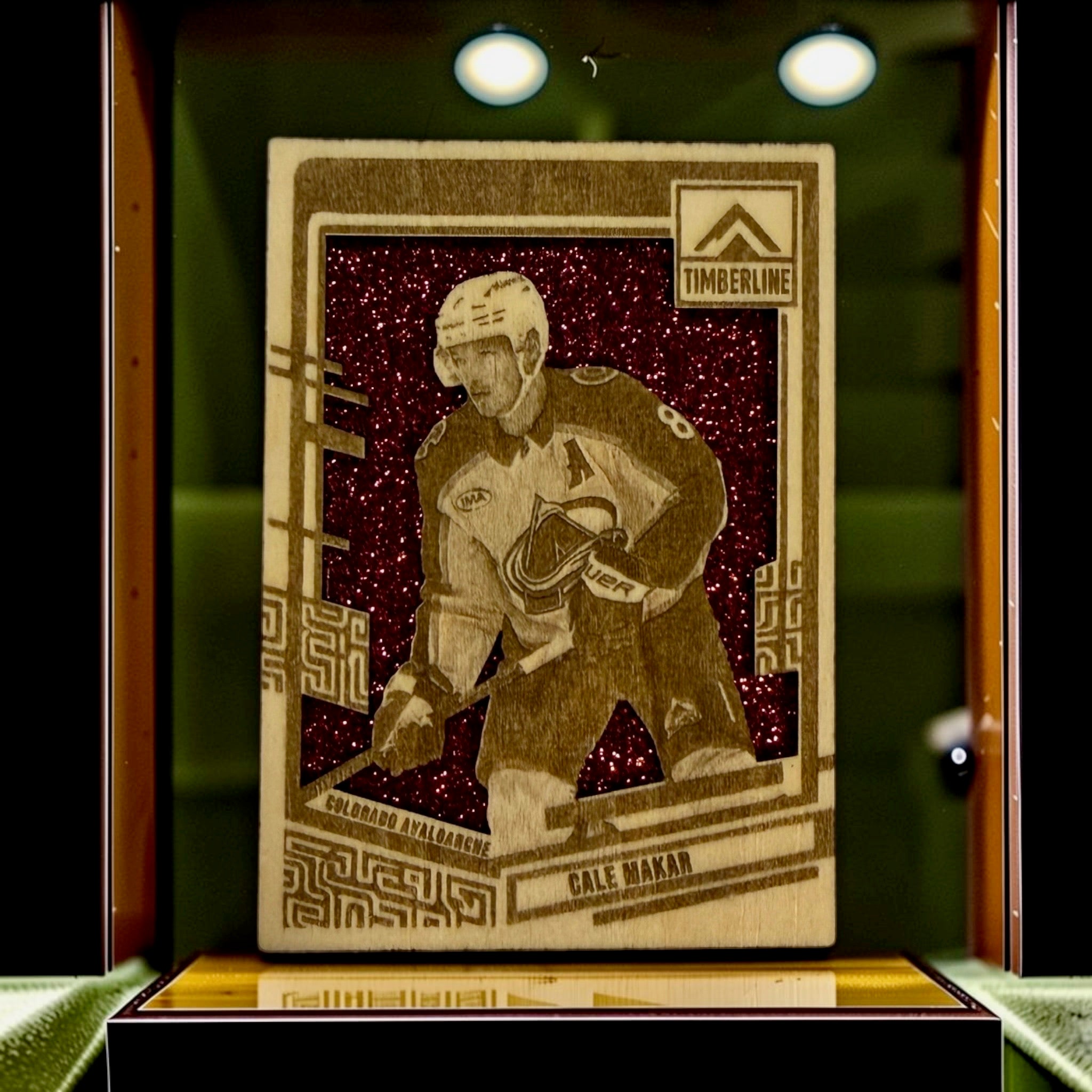 Cale Makar Colorado Avalanche Timberline wood card with red glitter background